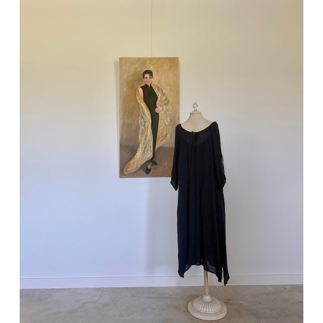 An original painting of elegant woman; unframed and in excellent condition.