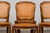 A beautiful set of eight early 20th-century French Louis XV style dining chairs, sourced in Provence, France. Crafted in...