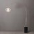 Featuring a sleek Satin Nickel finish, the Tambo Arc Lamp is a contemporary arc lamp with a Sphere White Satin steel shade...