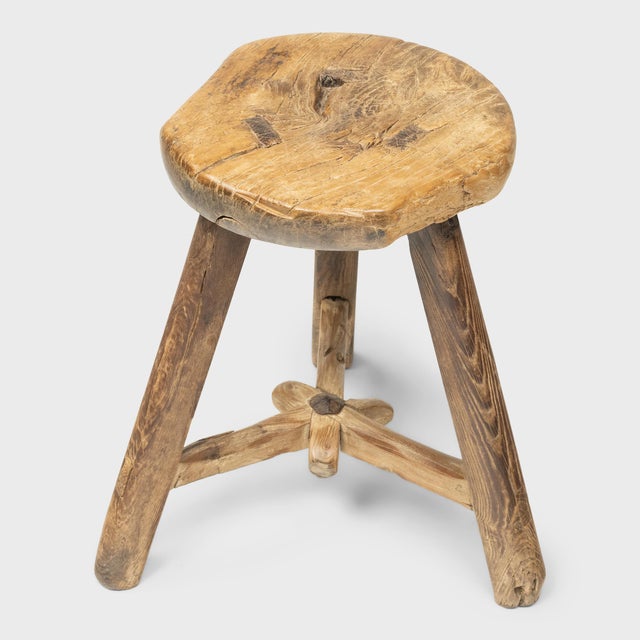Dated to the turn of the century, this provincial stool would have been used throughout a courtyard home as versatile...