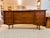 Stunning mid century modern triple dresser. Lots of storage with nine drawers. Original hardware with atomic age design...