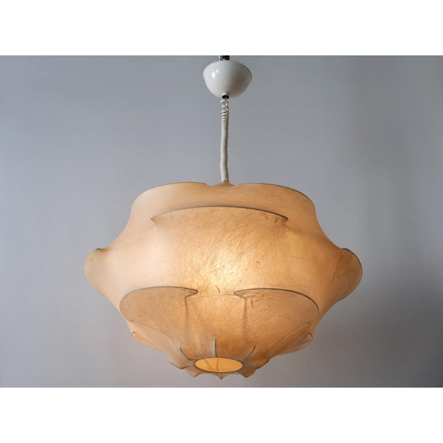 Extremely rare, highly decorative and large mid-century modern cocoon pendant lamp or hanging light. Designed &...