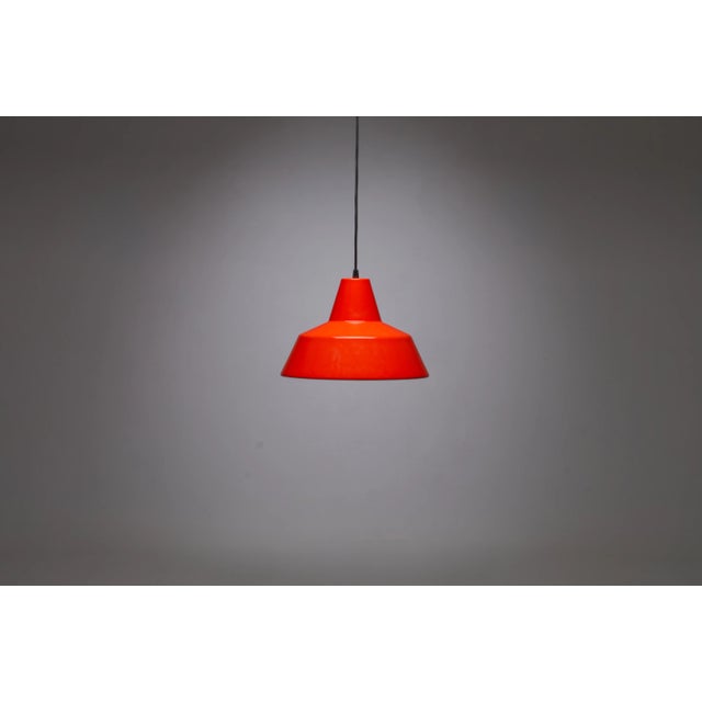 Orange Enamel Pendant from Louis Poulsen, 1969, in Good conditions. Designed 1960 to 1969 This piece is attributed to the...