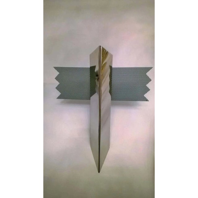 A set of rare 1980s Memphis style polished chrome sconces with decorative perforated gray fins by J.T. Kalmar. Original...