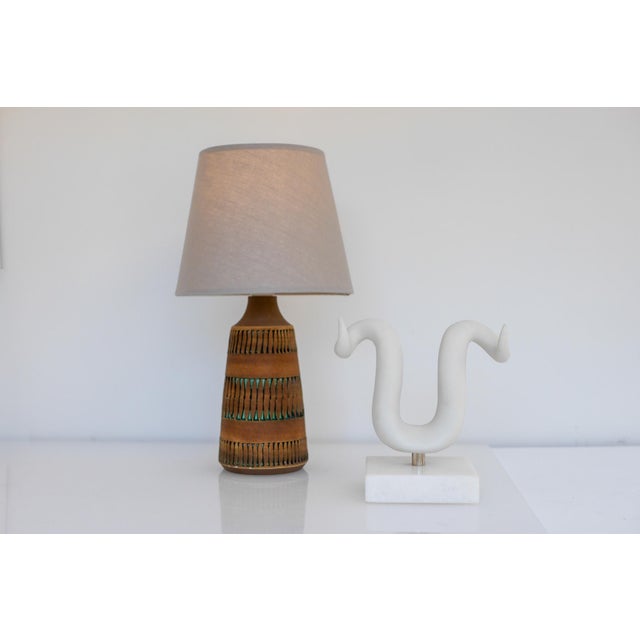 A ceramic lamp, handmade by thomas anagrius for kvidinge keramik, sweden. This lamp is simple in the design, with...