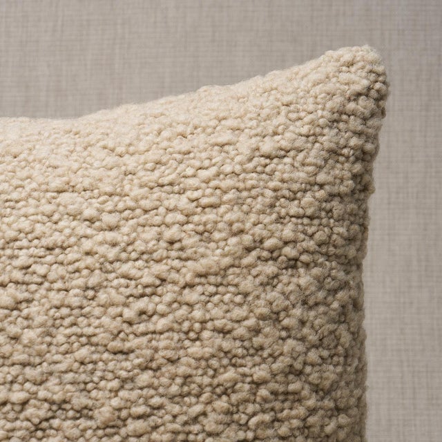 This pillow features Margarete Bouclé with a knife edge finish. Margarete in bisque redefines bouclé. Woven with a...