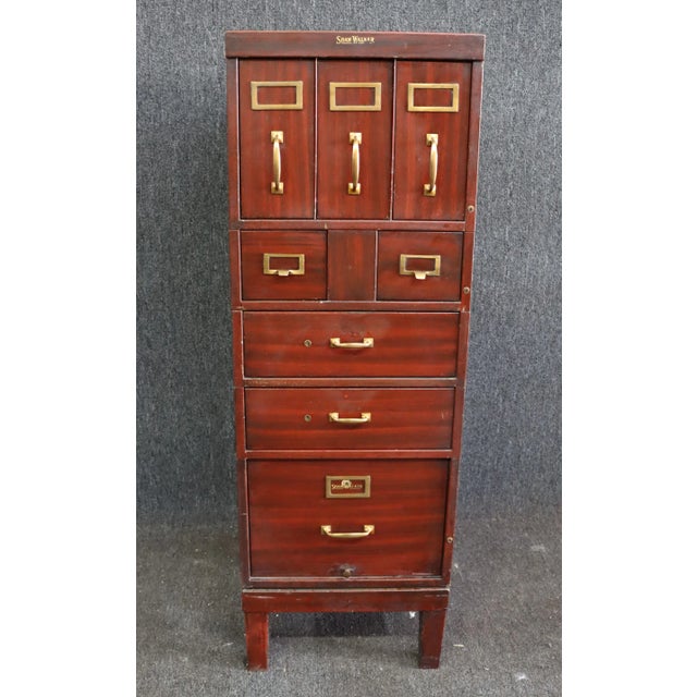 Industrial steel file cabinet made by Shaw Walker . Faux painted mahogany mahogany finish , this is a stacking file...
