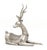 Thai Recumbent Deer Nickel Plate Sculpture. 31.75" H x 20.5" W x 6" D. Provenance: From a 422 East 72nd Street Estate.