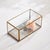 Simple and tailored, this glass and brass box is made to hold your most treasured mementos. A delicate loop handle keeps...