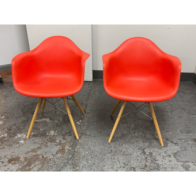 Design Plus Gallery presents a Pair of the Eames Molded Plastic Armchairs from Herman Miller. Designed by Charles and Ray...