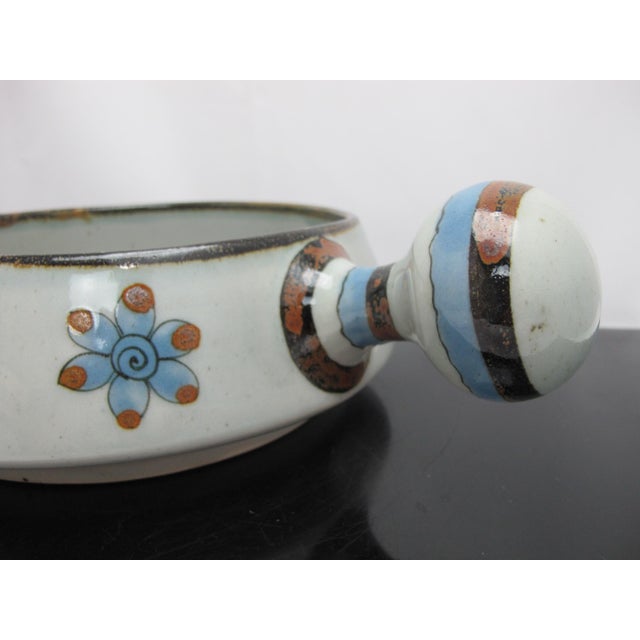 Ken Edwards Mexican folk art pottery casserole serving dish with handle. Hand crafted in Tonala, Jalisco, Mexico, this...