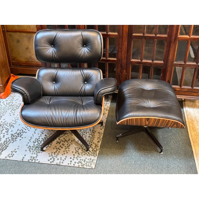Design Plus Gallery presents a Set of Reproduction Imus Eames Chair + Ottoman from Curver K. The set is just like the icon...