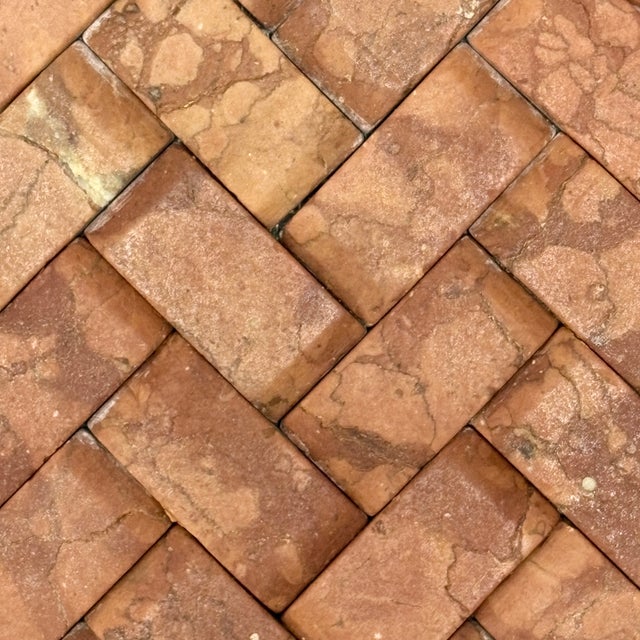 Honed rosso verona marble 1" x 2" dimensional herringbone decorative mosaic tile. Suitable for use in vertical...