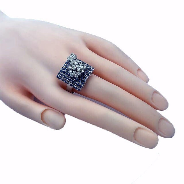 Charming and authentic by designer Sonia B. This ring is crafted from 18k white gold featuring a 20mm square with open...