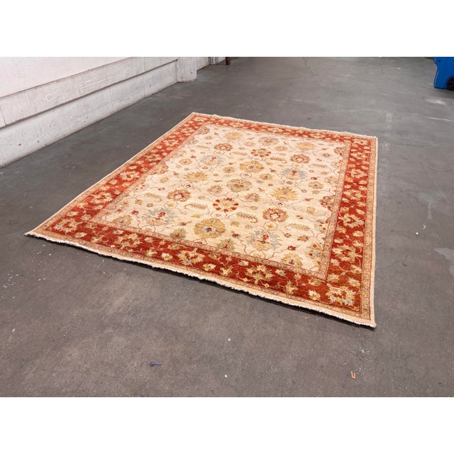 Design Plus Gallery presents a 7ft 11 in X 10ft 1 in Vasari Hand-Knotted Wool Area Rug. This 100% wool rug displays an...