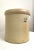 This Early American antique salt-glazed crock once used for general utilitarian kitchen use is now a standout decor piece...