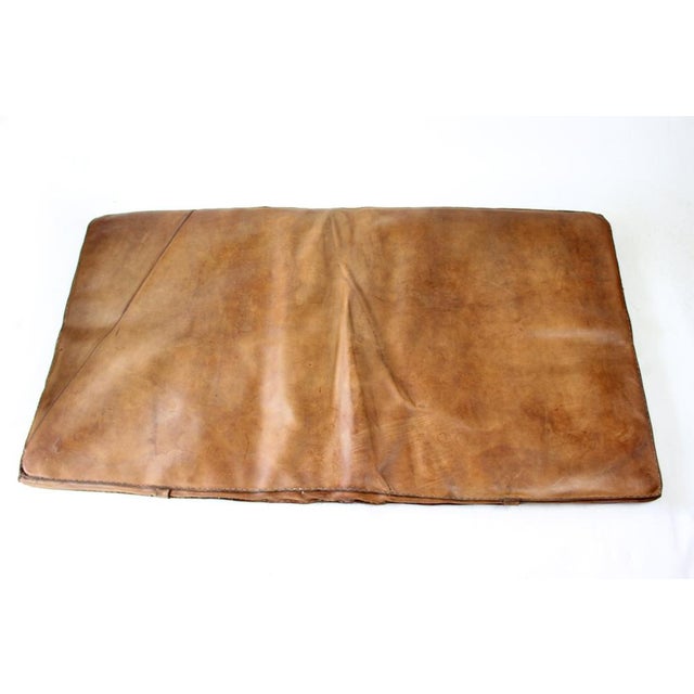An authentic 1930s gym mat from former Czechoslovakia, crafted from thick, high-quality leather with a beautifully aged...