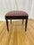 Vintage Georgian style vanity bench featuring elegant tapered legs, carved details, and a rich mahogany-stained wood...
