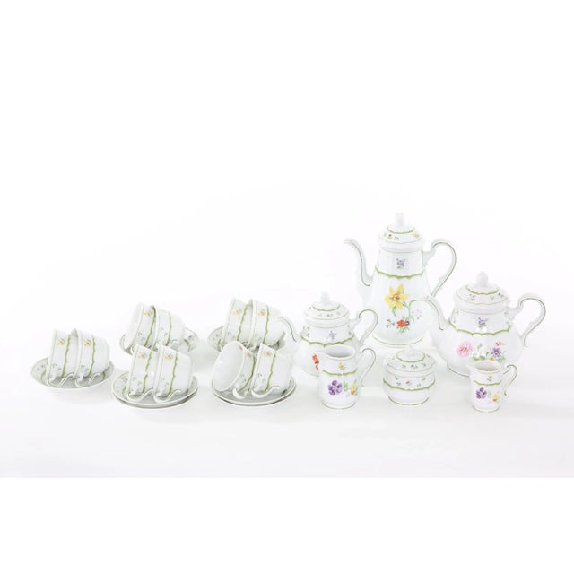 German porcelain tea / coffee service for ten people. Each piece is in great condition. Maker's mark undersigned "Crown...