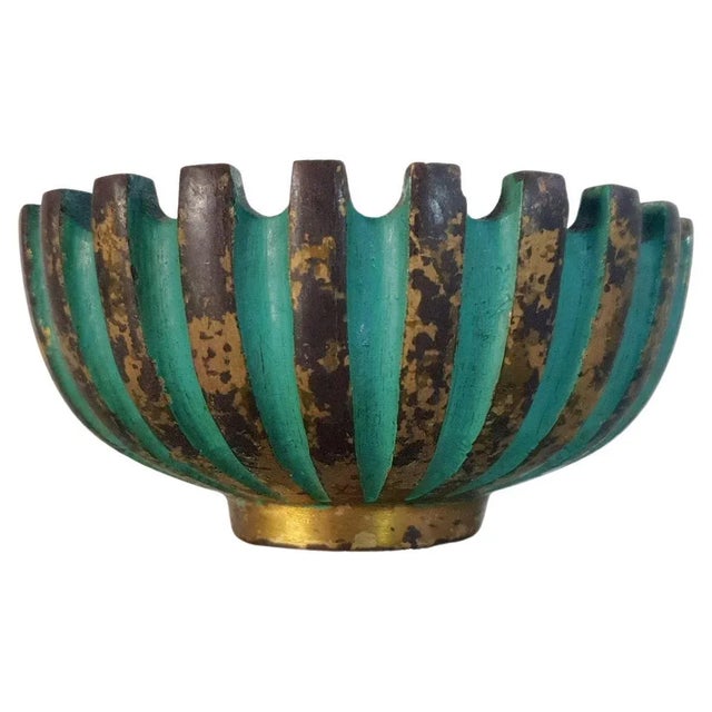 A solid bronze object bowl with verdigris patina and hand hammered inside designed by Hungarian designer Maurice Ascalon...