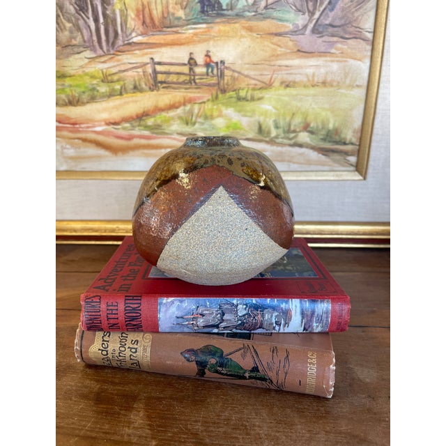 Vintage studio pottery vase, signed and dated 1998 on the underside. The piece features a rounded, low-profile form with a...