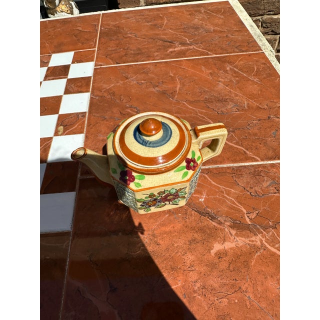 Up for consideration is a beautiful hand painted floral tea pot. This would look lovely in your home and it is a great...