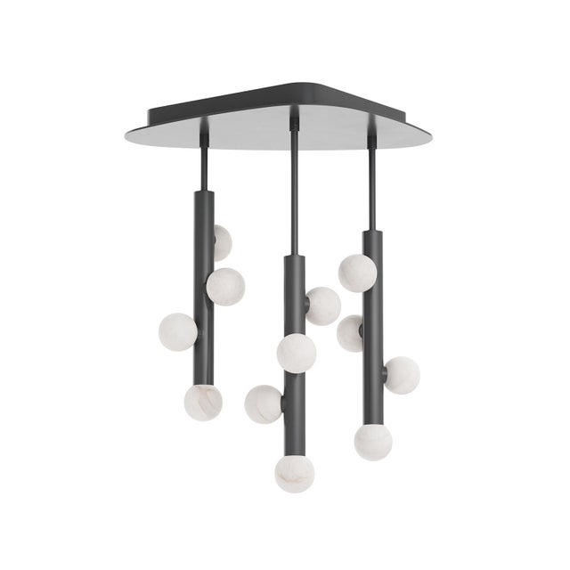 The Rhoads Chandelier embodies bold simplicity and sculptural intent. Inspired by the curved geometry of a guitar pick,...