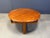 Mid century solid teak coffee table attributed to Niels Bach. beautiful round table top with an interlocking base. Very...