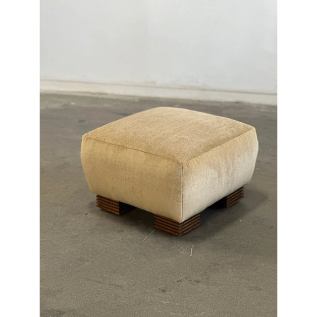 W22 D22 H14.5 SW19.5 Minimal small ottoman with a subtle details. Unit features a slight belly on the sides and on the...