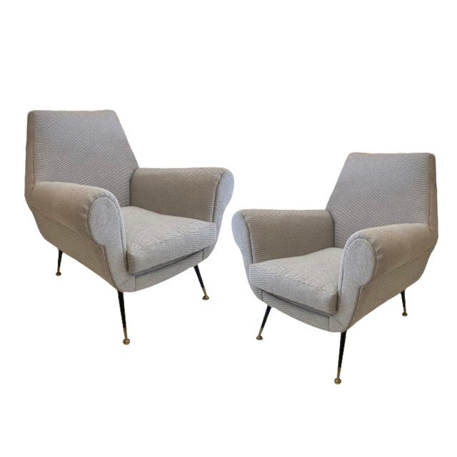 Pair of Italian armchairs designed from the 50s by Gigi Radice for Minotti, recently restored and upholstered in stain-...