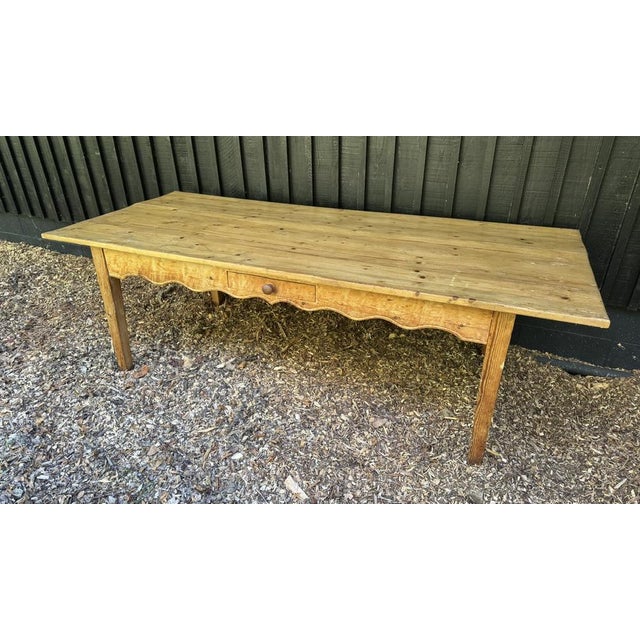 A larger Pine Farmhouse Dining Table, having single drawer to front and original colour and patina. A good end overhang...