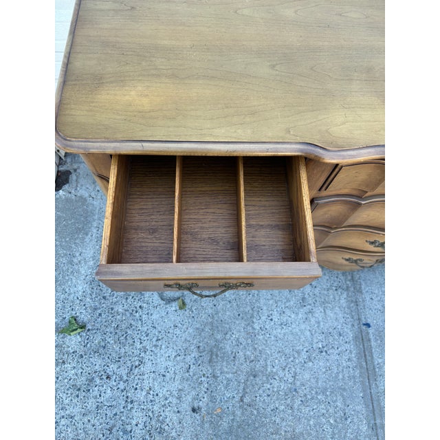 We have a beautiful vintage French Provincial buffet sideboard for sale. This French Country credenza features a...
