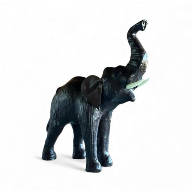 Liberty-style elephant, circa 1950, made of hollow wood, straw, and leather. A decorative item promoted in the 1940s by...