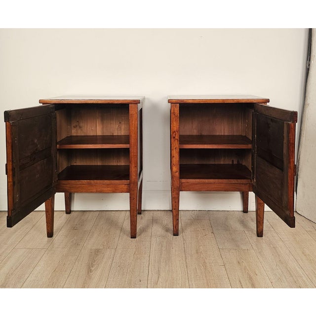 A bespoke pair of Italian small commodes - cabinets in cherry; originally with drawers, now they have one cabinet door...