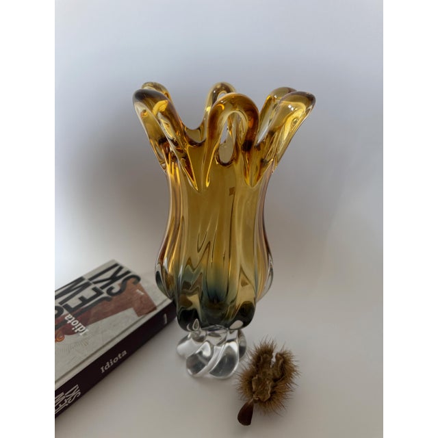 A striking sculptural art glass vase produced by the renowned Egermann Glassworks in Nový Bor, Czech Republic, celebrated...