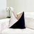 Elevate your space with this contemporary color block velvet throw pillow in black, cream and beige. It's bold and...