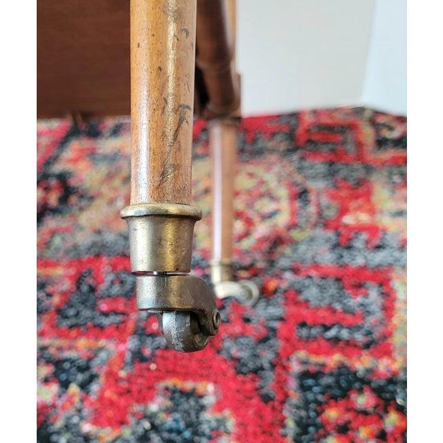 Fabulous small size well crafter mid century bamboo carved magazine rack in burl wood. Measures 18 inches wide by 13...