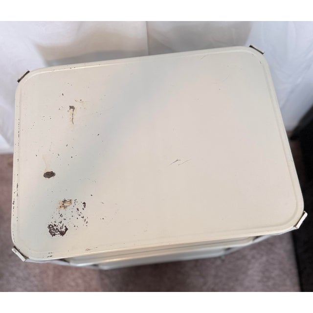 Authentic mid-century industrial medical utility cart, originally used in a hospital or laboratory setting. This piece...