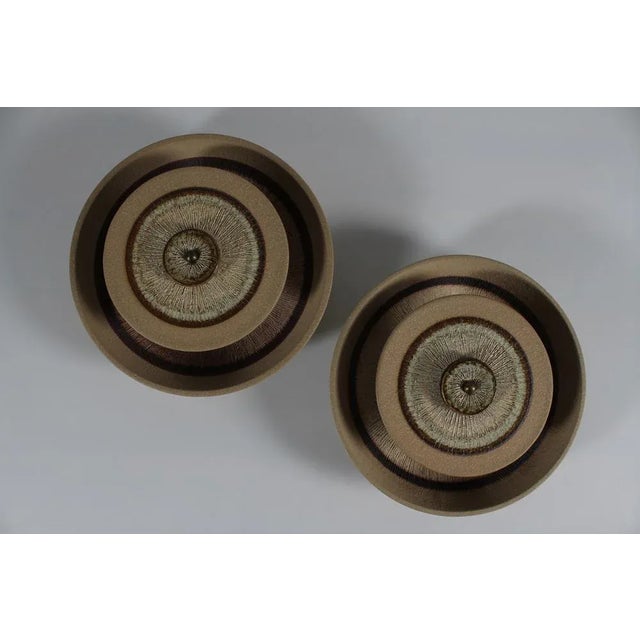 Pair of large stylish Danish mid-century wall sconces. The wall lamps are made by the acknowledged pottery Søholm on...