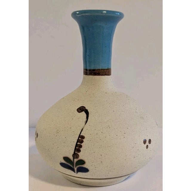 Bring a touch of Mexican folk artistry to your home with this signed Tonalá sandstone bud vase. Crafted in the traditional...
