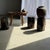 Side table in black petrified wood with beige sides, H35 D24. Petrified wood is a fossilized wood (same family as...