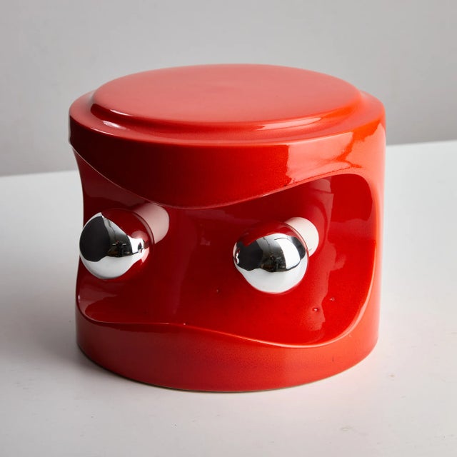 Introducing our beautiful orange ceramic lamp, with its unique rounded design that’s more than just a light source—it's a...