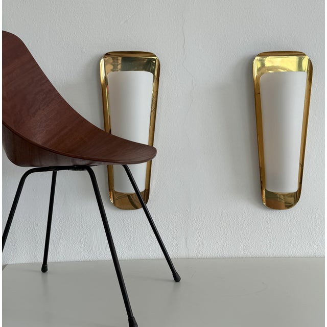 Pair of gorgeous extra large wall sconces made of brass wall plates and opaline glasses. all hand-crafted in germany...