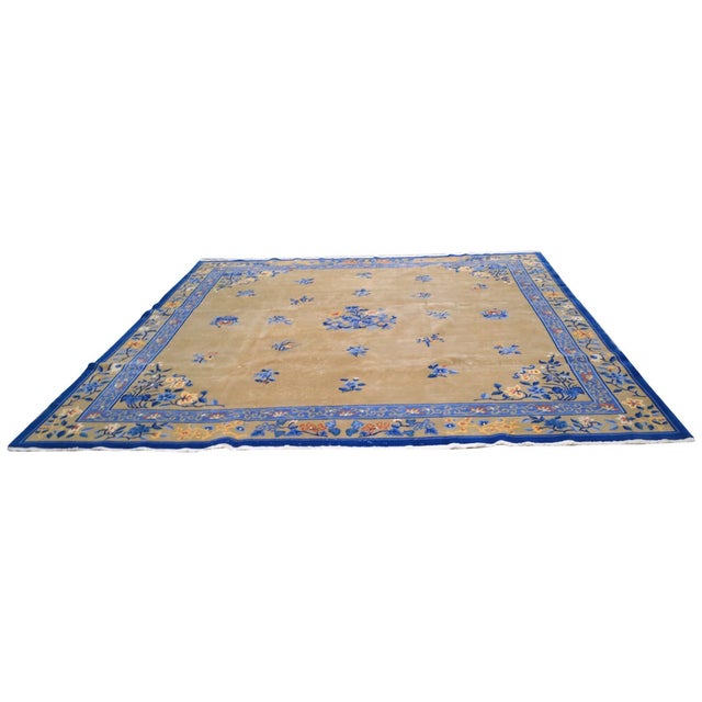 Hand-knotted with care using traditional rug-making techniques, this wool rug blends timeless craftsmanship with a modern...