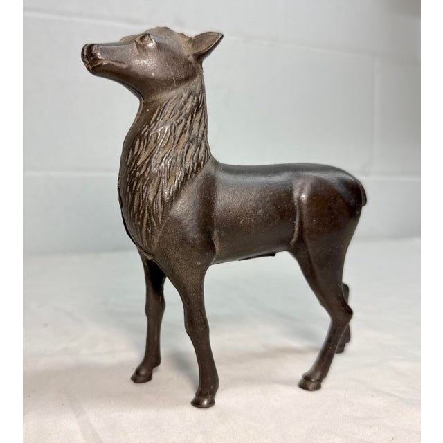 Up for sale is a large antique early 1900's AC Williams cast iron deer still bank. This collectible bank is unique and...