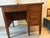 Antique small oak desk from the Derby Desk Company, early 1900s.