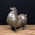 This charming antique bronze sculpture depicts a horse in a dynamic, stylized pose reminiscent of Tang dynasty ceramic...