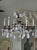 Pair of Maison Bagues Patinated Iron and Rock Crystal Chandeliers For Sale - Image 9 of 9