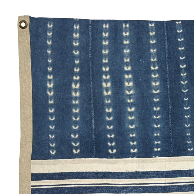 This unique cotton flag is made from vintage African textiles. The shibori dye and hand-stitching are original, and...