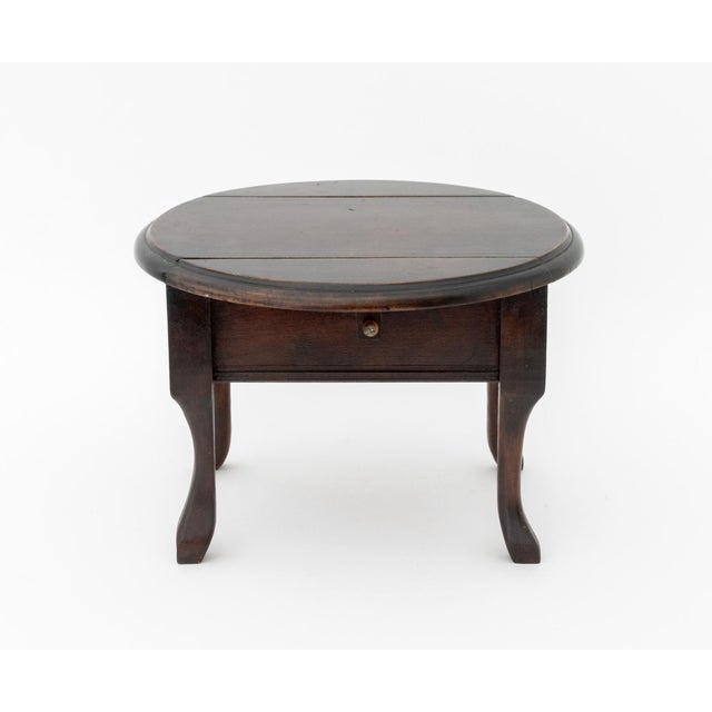 Three Vintage Salesman Sample Pembroke Tables and a Marquetry Writing Table. Taller close: 9.5" H x 9.75" W x 9.25" D;...